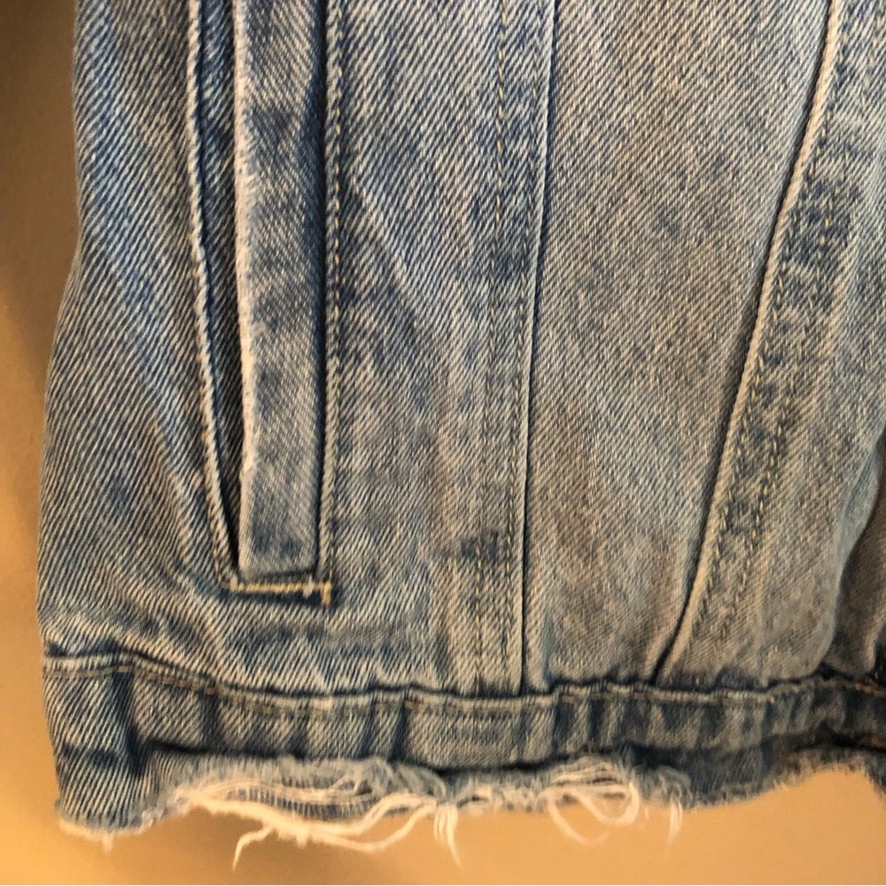 Women’s jean jacket fits small to medium